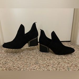 Black ankle bootie shoes.
